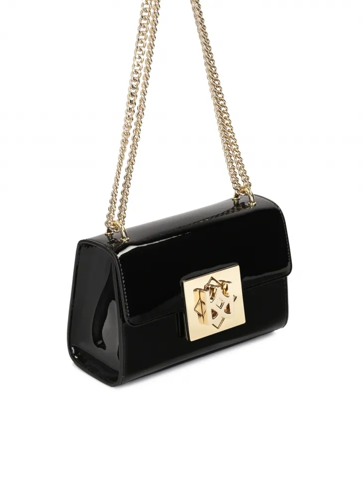 Sac noir laqué avec un gros cadenas
